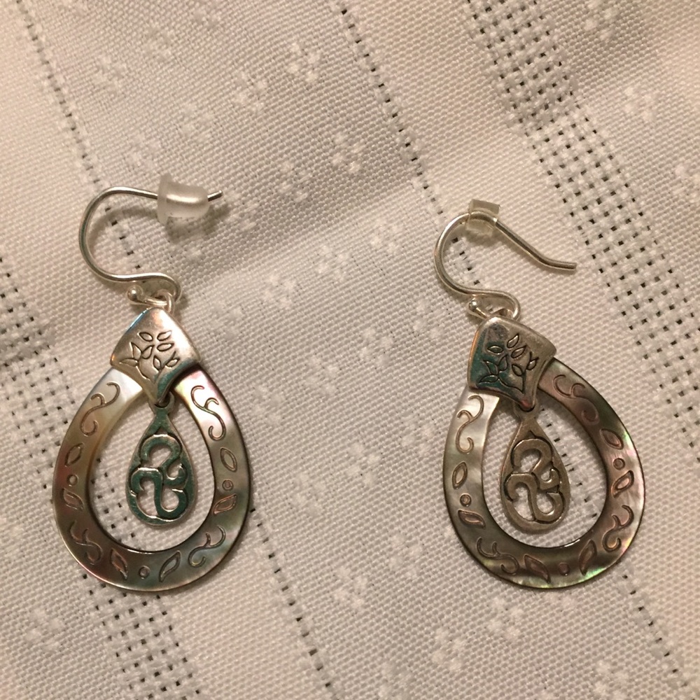 Silpada etched black lipped shell earrings.